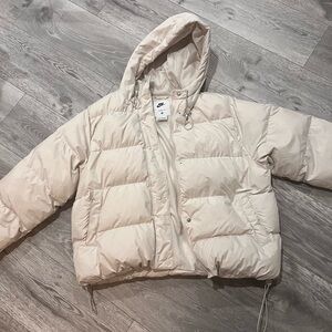 Nike Therma-FIT Hooded Puffer Jacket in Light Cream